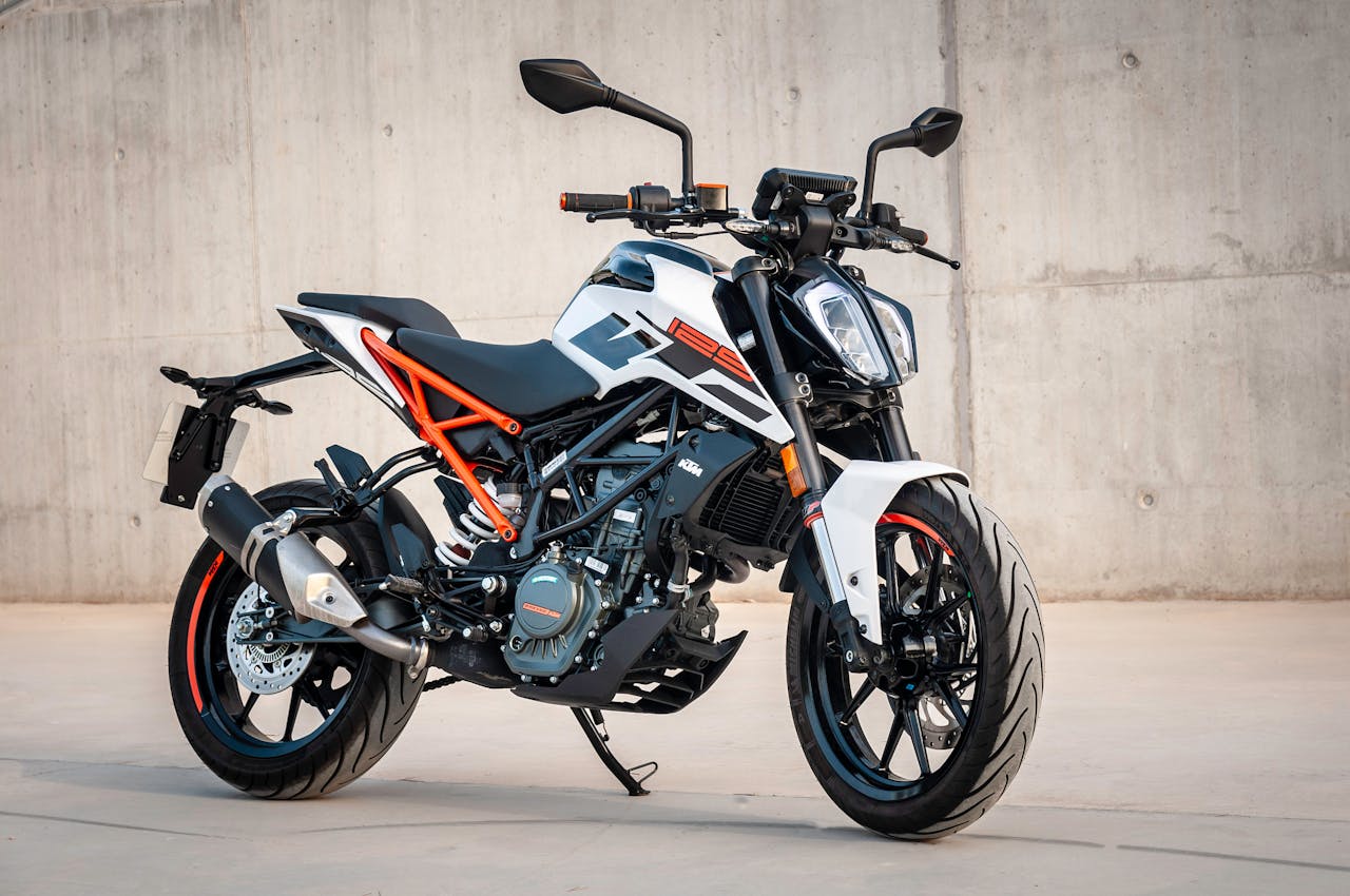 Mastering the First Impression: Your intriguing post title goes here A modern sports motorcycle parked in an industrial setting, showcasing its design.